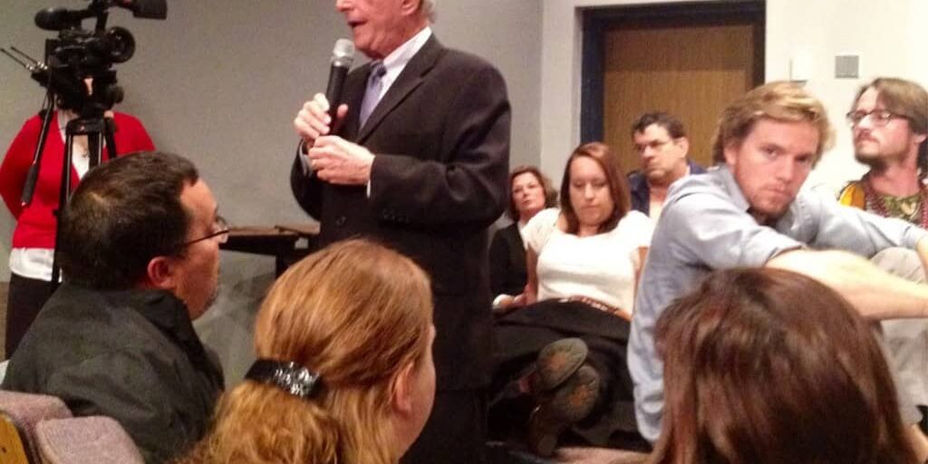 College speaker addressing students at eCorsair event.