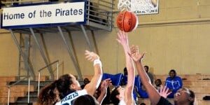 Lady Pirates basketball players in action during a game at eCorsair.