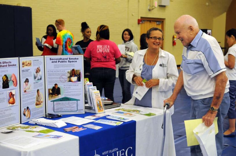 Community health fair offering free screenings and health information for awareness.