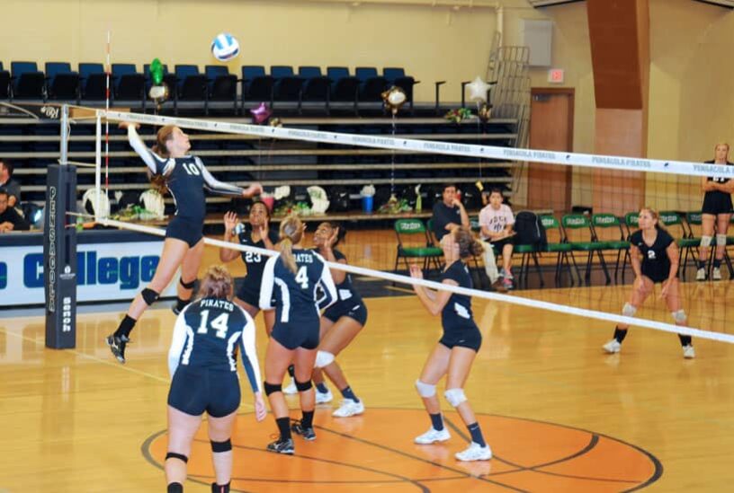 ECorsair volleyball team winning last home game at Pensacola State College.