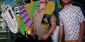Two men with a cartoon character at Major Lazer's "Original Don" video event.