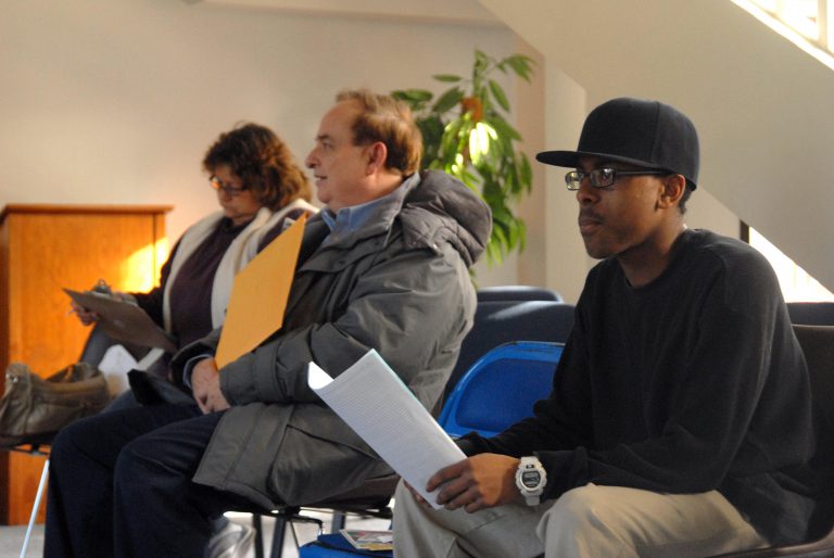 Students receiving free tax help at PJC, promoting community support.