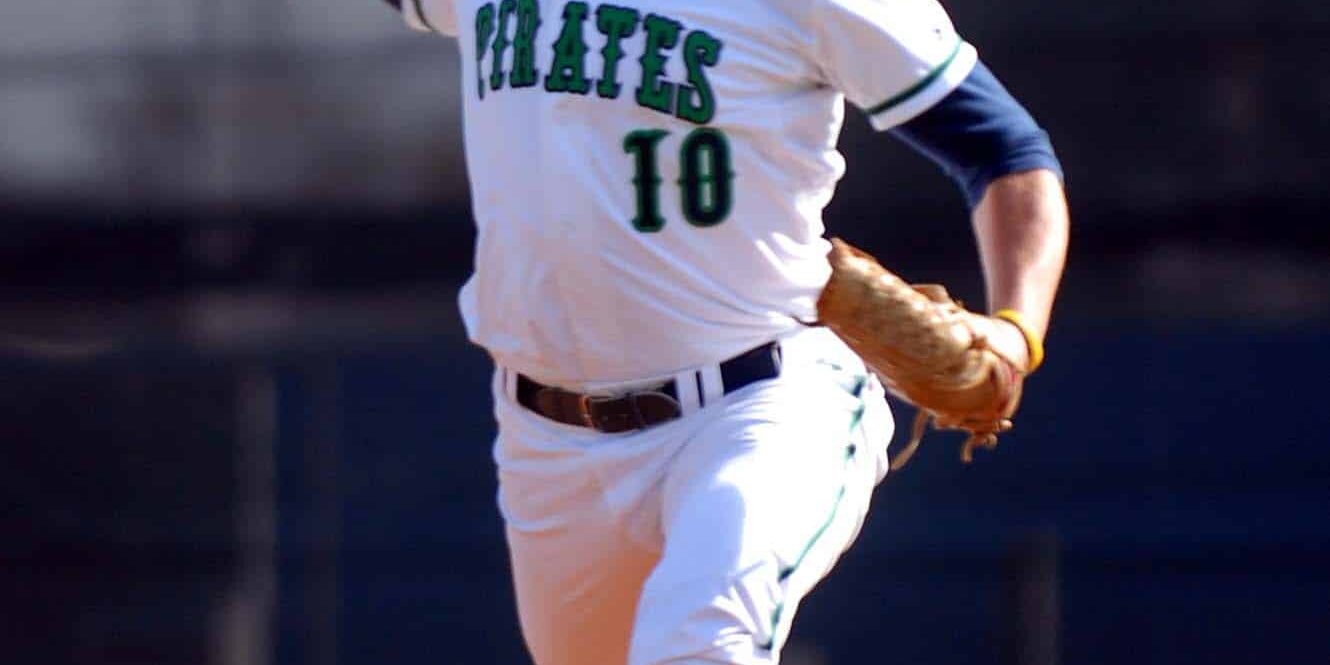 Young Pirates player pitching on the mound during a game at Pensacola State College.