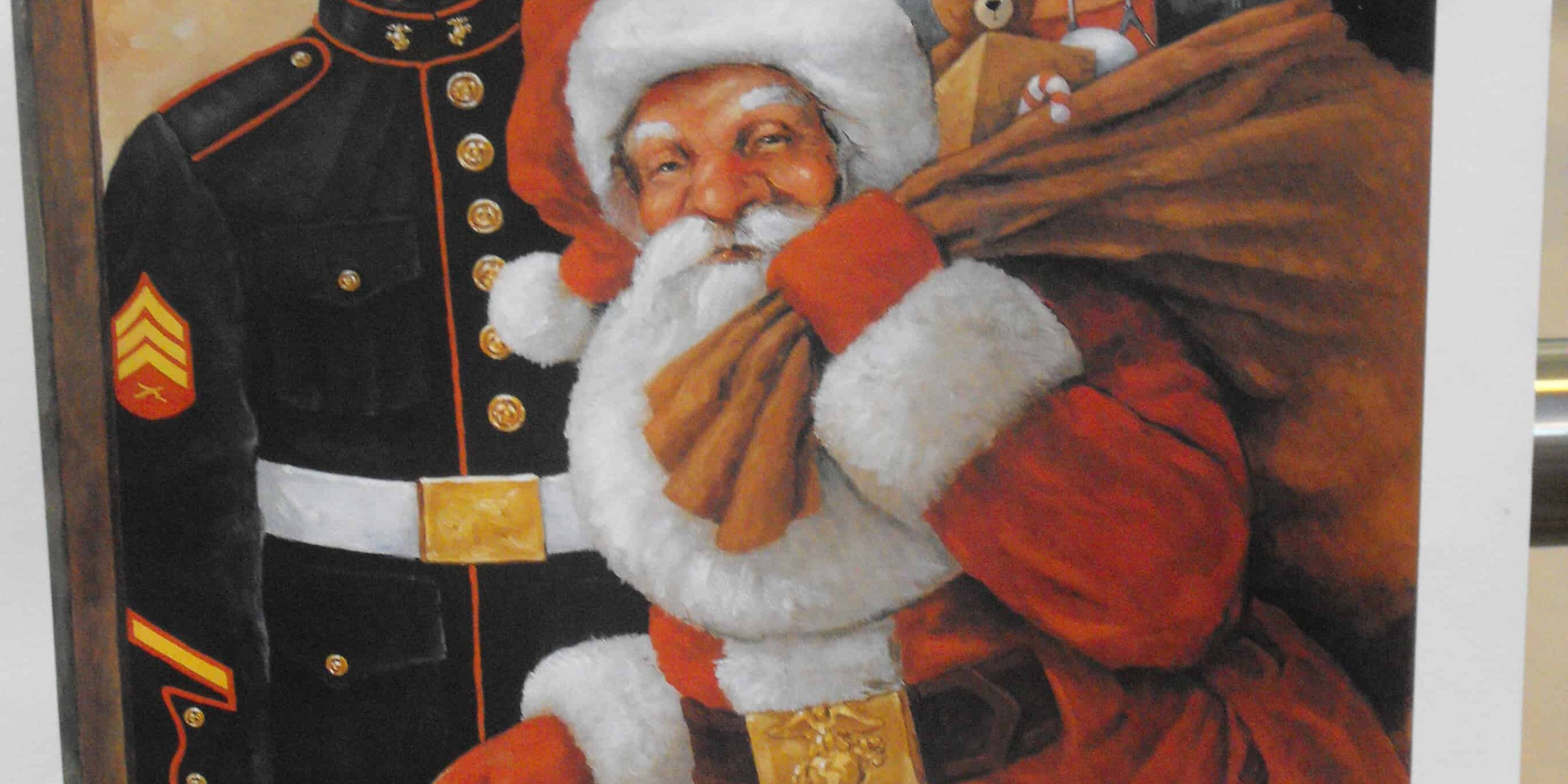 Santa Claus collecting toys for Toys for Tots charity drive.