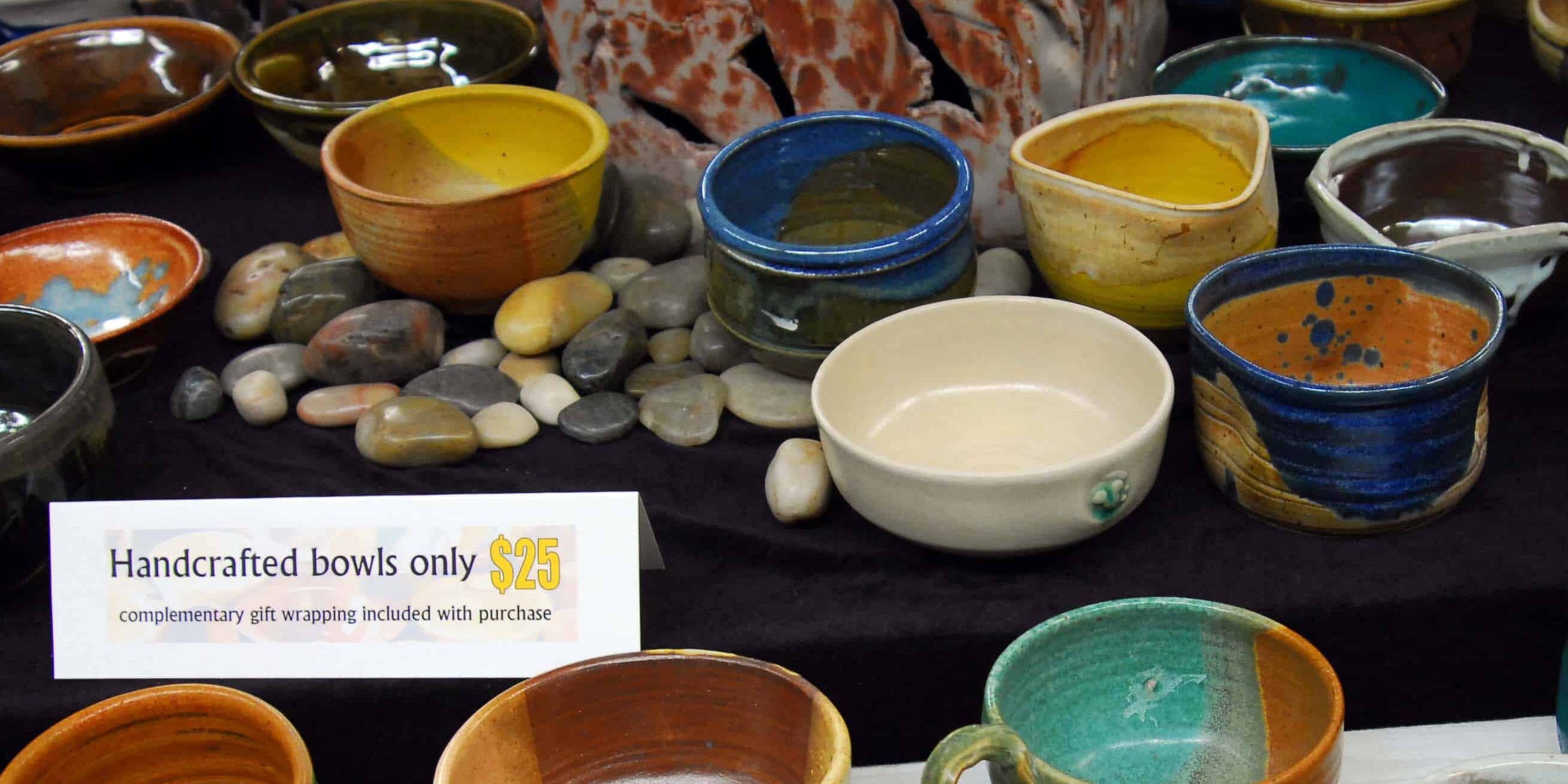Handmade pottery bowls for charity at Pick-a-bowl event supporting Manna Food Bank.