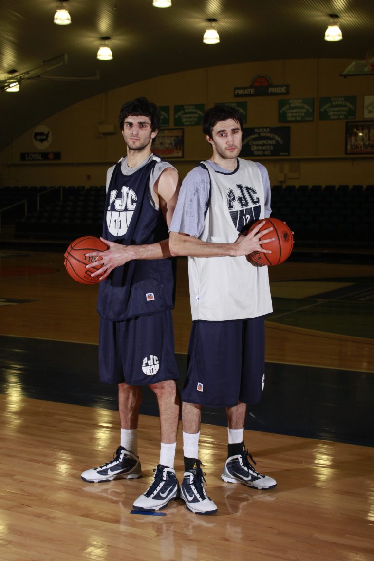 Basketball players at eCorsair gymnasium for Pensacola State College.