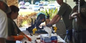 Volunteers at eCorsair event helping community during United Day of Caring.
