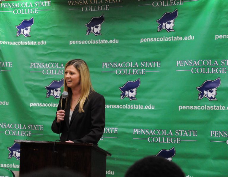 Woman speaking at Pensacola State College eCorsair event.