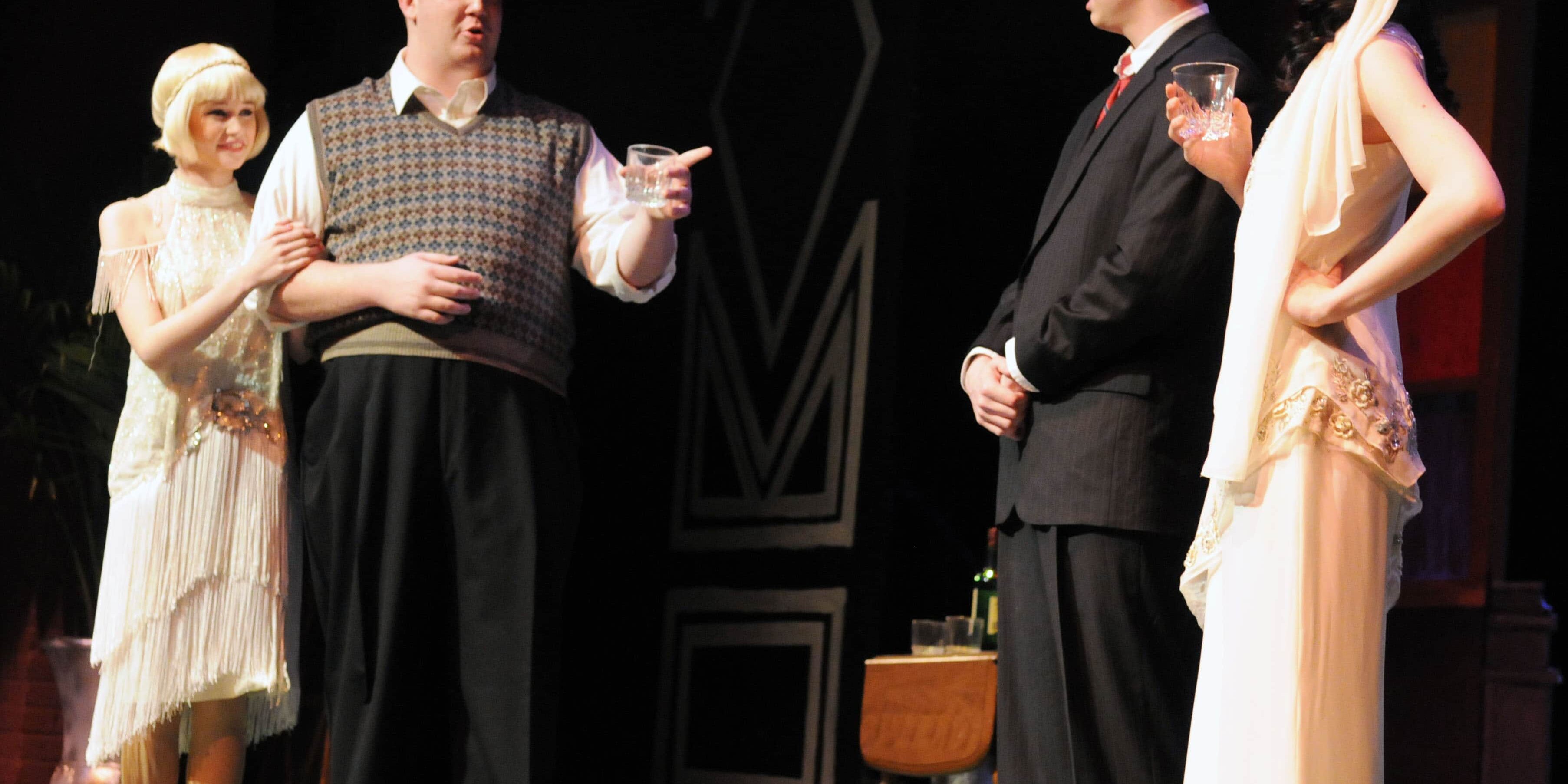 Gatsby-themed student performance scene at Ashmore, showcasing costumes and acting from the play.