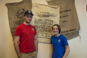Robert Whitehead and Myranda Jernigan, baristas at Coffee Break Cafe, pose in front of a decorative display at Coffee Break Cafe January 12, 2015. Coffee Break Cafe opened in the Pensacola State College library January 7, 2015. Corsair photo by Jessica Echerri.