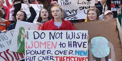 Women's March in Pensacola promoting women's rights and equality.