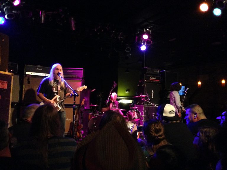 Dinosaur Jr. playing live at the eCorsair venue in Pensacola during their visit.