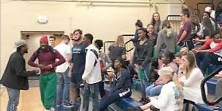 eCorsair student section at Barron’s Corner PSC students cheering at Barron's Corner during basketball game.