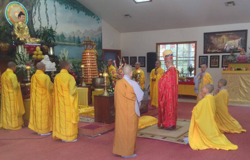 Monks meditating in a peaceful temple setting for stress relief and happiness.