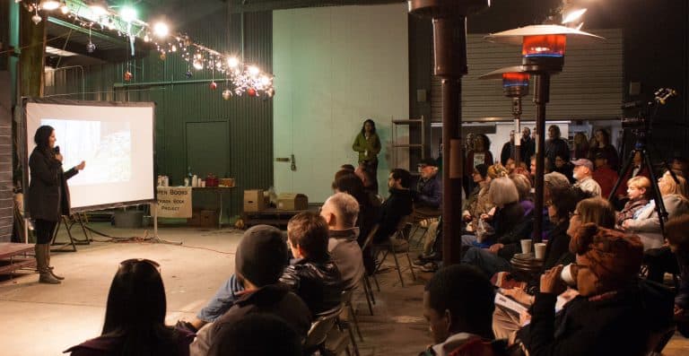 Instructor presenting to engaged audience at eCorsair event.