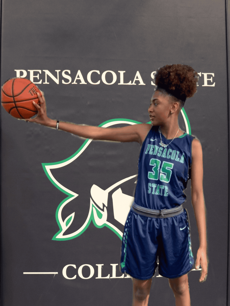 Young female student athlete practicing basketball at Pensacola State College.