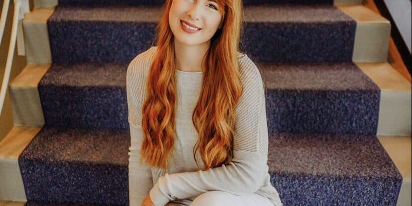 Student sitting on stairs at eCorsair, Pensacola State College campus. Student sitting on stairs at eCorsair, Pensacola State College campus.
