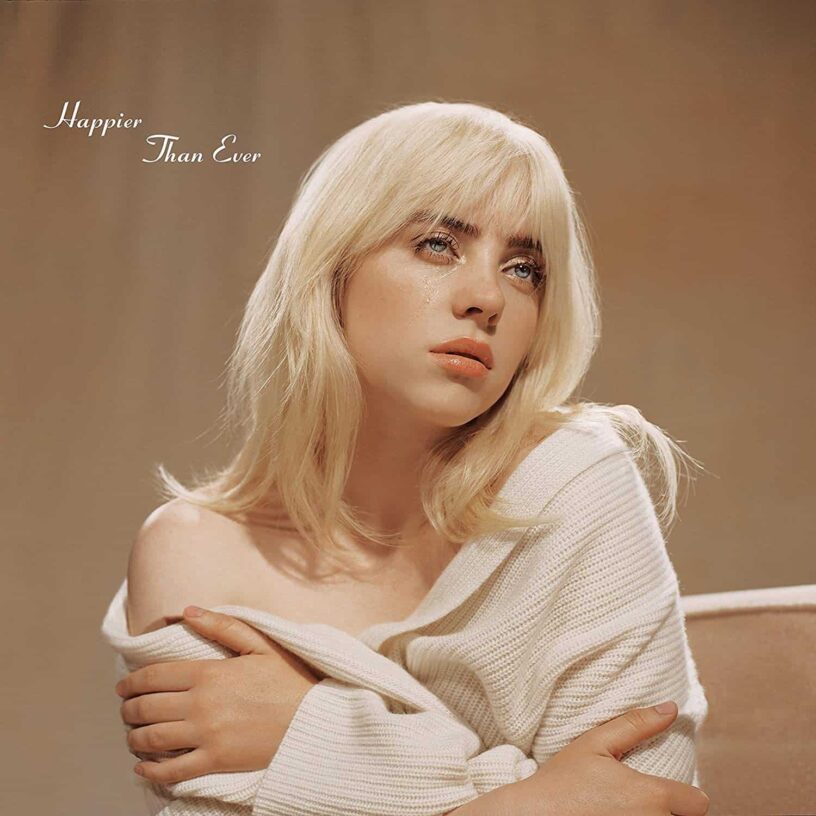 Happier Than Ever Album Cover Close-up of a woman with blonde hair and a white sweater, looking contemplative.