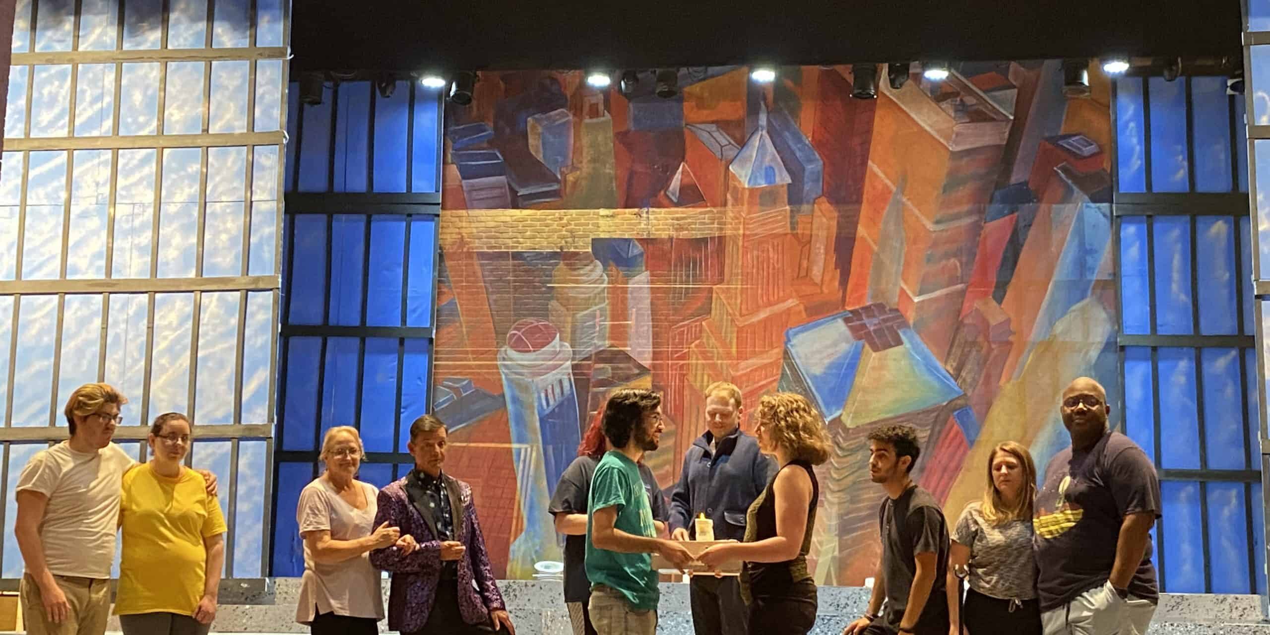 Picture of the cast of Company during the musical number, Side by Side by Side.