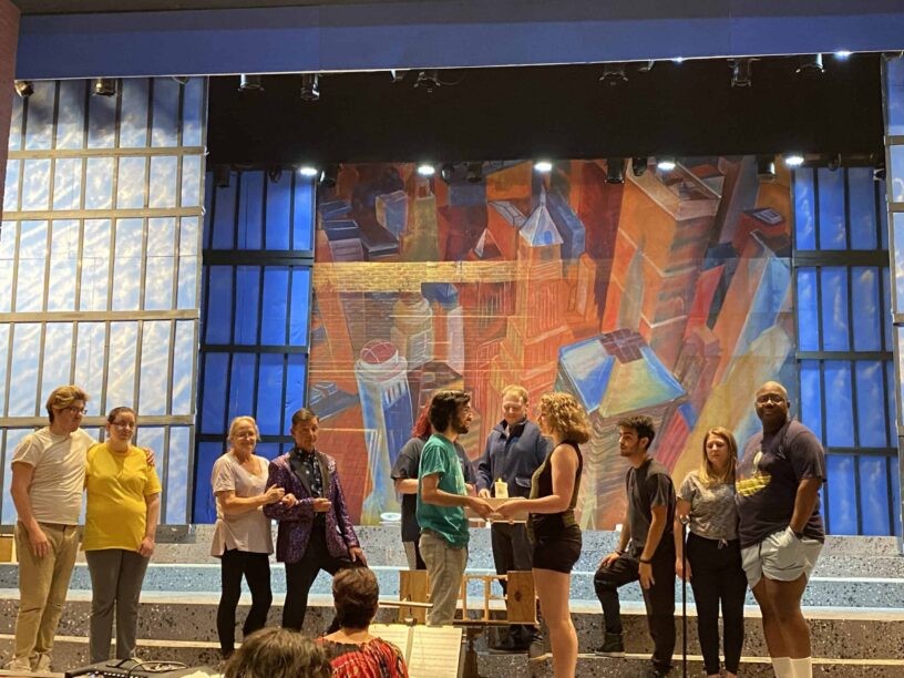 Picture of the cast of Company during the musical number, Side by Side by Side.