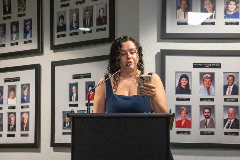 Student speaking at podium during eCorsair event at Pensacola State College.