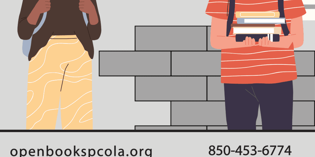 Students discussing books at Open Books bookstore in Pensacola.