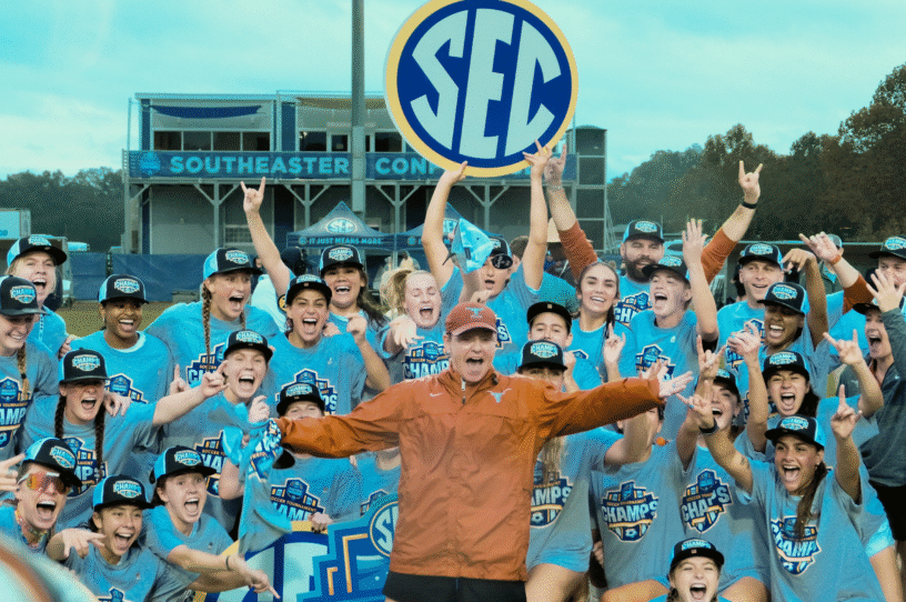 Cheerleaders celebrating SEC victory at Sun-Lakes Conference event.