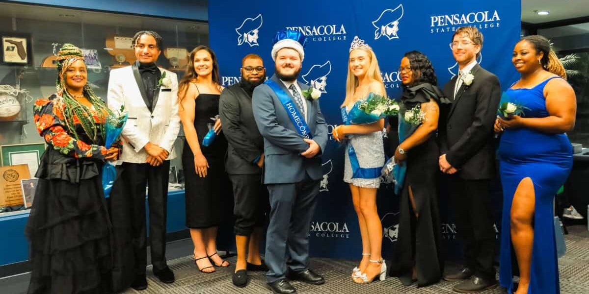 Alumni and students at PSC celebrating homecoming tradition.