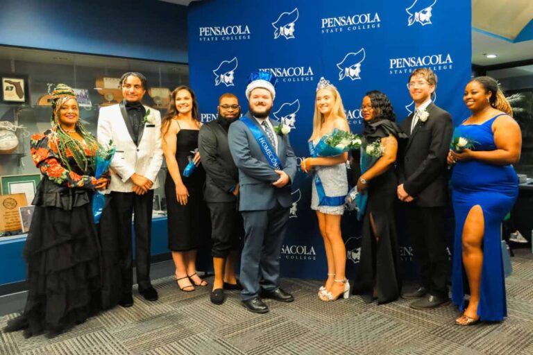 Alumni and students at PSC celebrating homecoming tradition.