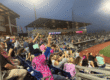 Fan crowd enjoying a game at Blue Wahoos Stadium during evening hours.
