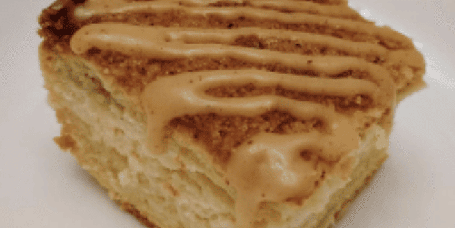 Sopaipilla Cheesecake with Cinnamon Glaze Delicious Sopaipilla cheesecake topped with a perfect cinnamon glaze, blending creamy texture with w.