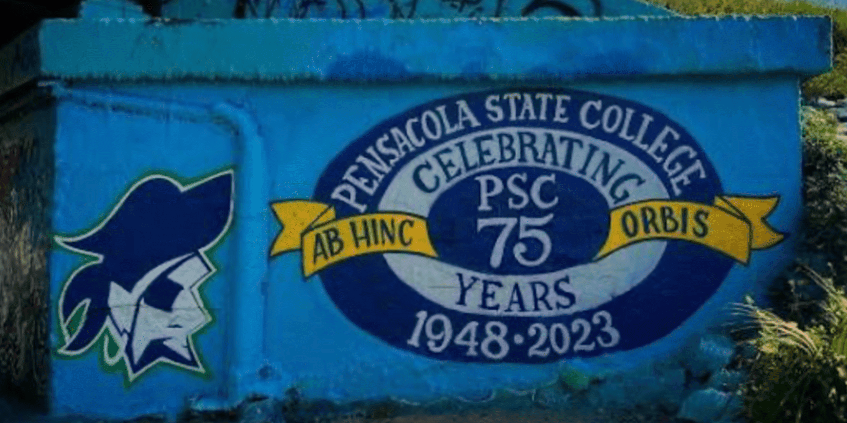 Mural celebrating 75 years of Pensacola State College, featuring the college logo and mascot.