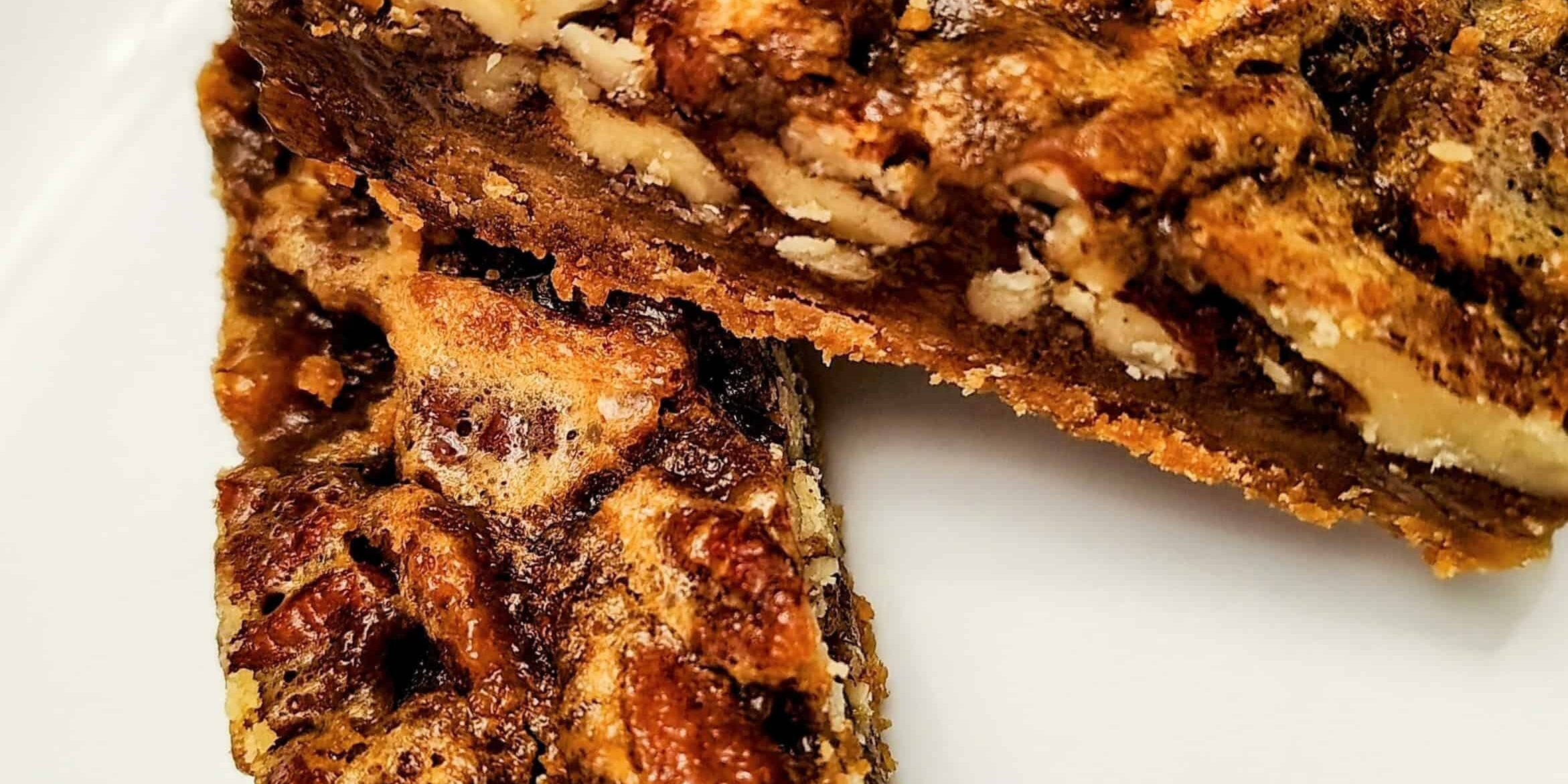 Delicious pecan pie bars with rich caramel and crunchy pecans, perfect for dessert or special occasi.