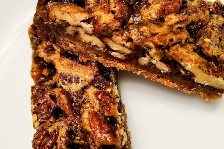 Delicious pecan pie bars with rich caramel and crunchy pecans, perfect for dessert or special occasi.