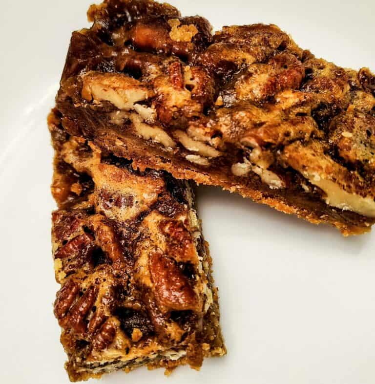 Delicious pecan pie bars with rich caramel and crunchy pecans, perfect for dessert or special occasi.