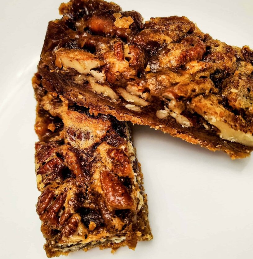 Delicious pecan pie bars with rich caramel and crunchy pecans, perfect for dessert or special occasi.