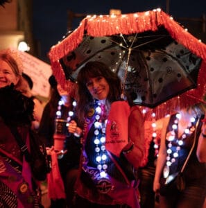 Decorative image of a Mardi Gras parade.