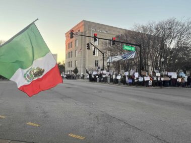 Decorative image of Pensacola ICE protest.