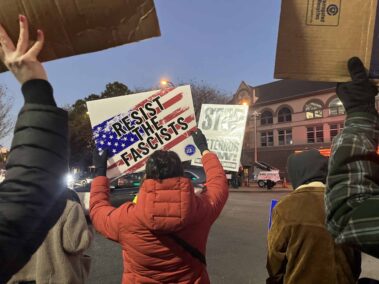 Decorative image of Pensacola ICE protest.