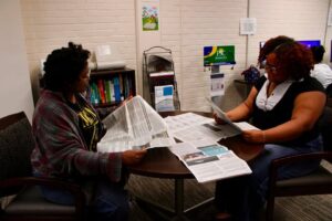 PSC students reviewing new editions of The Corsair